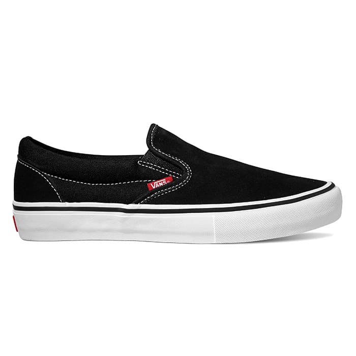 mens black and white slip on vans