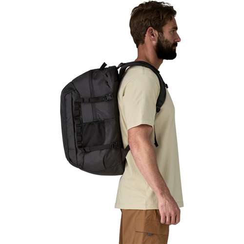 commuter backpack rain RAINS Mini, Black Waterproof Laptop Bag for Women and Men, Small | Small waterproof backpack in black with a 15 in laptop pocket, flap, and carabiner SPORT_VALUE:TREKKING|TROPICAL TREKKING Cotopaxi backpack Mente 32L color:White black Waterproof 25L roll