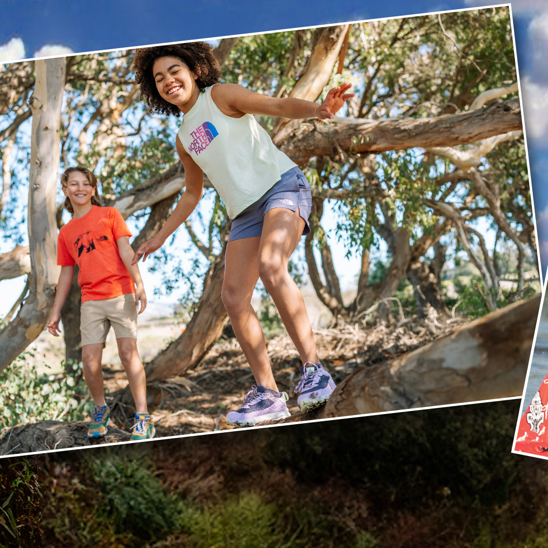 two girls at summer camp playing in the North Face outdoor clothing.
