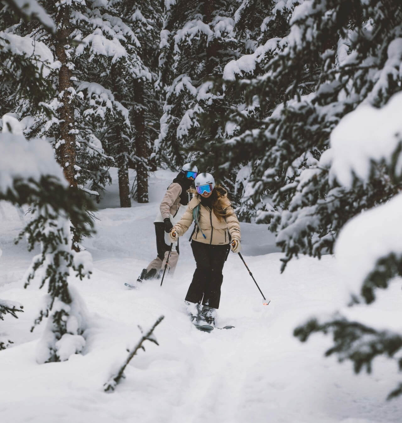 A pair of outdoor adventurers using skis fixed at Sun & Ski's ski shop in North Conway.
