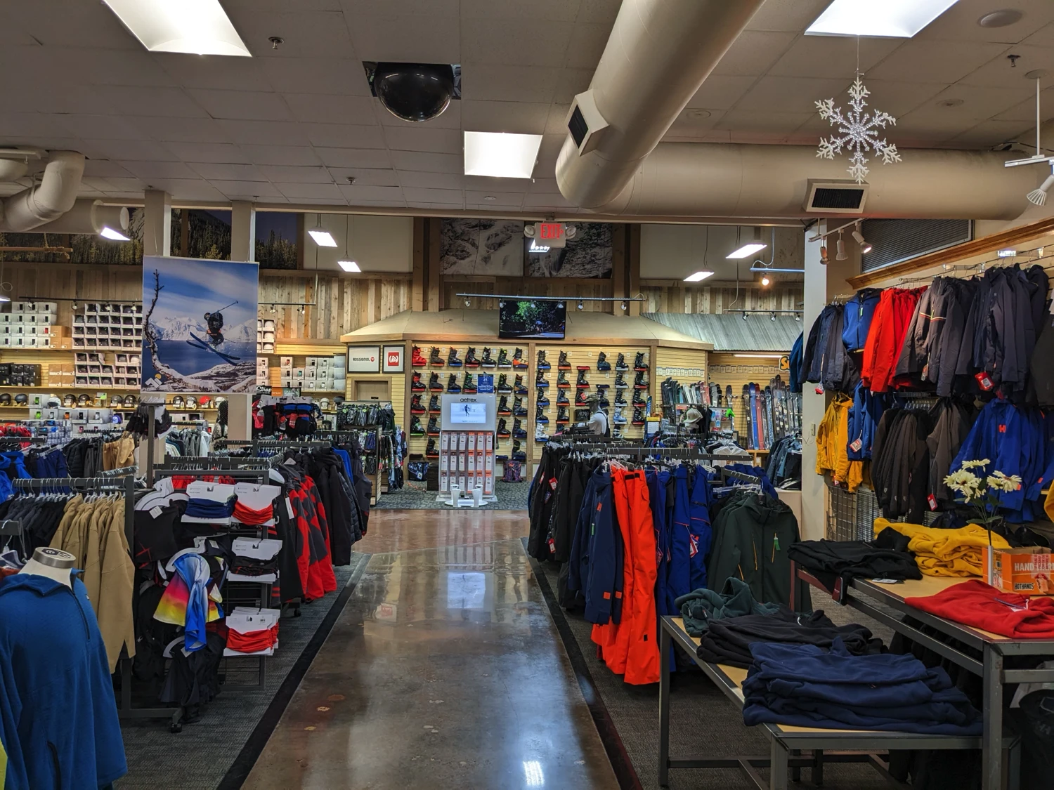 A collection of ski and snowboard gear at Sun & Ski Sports