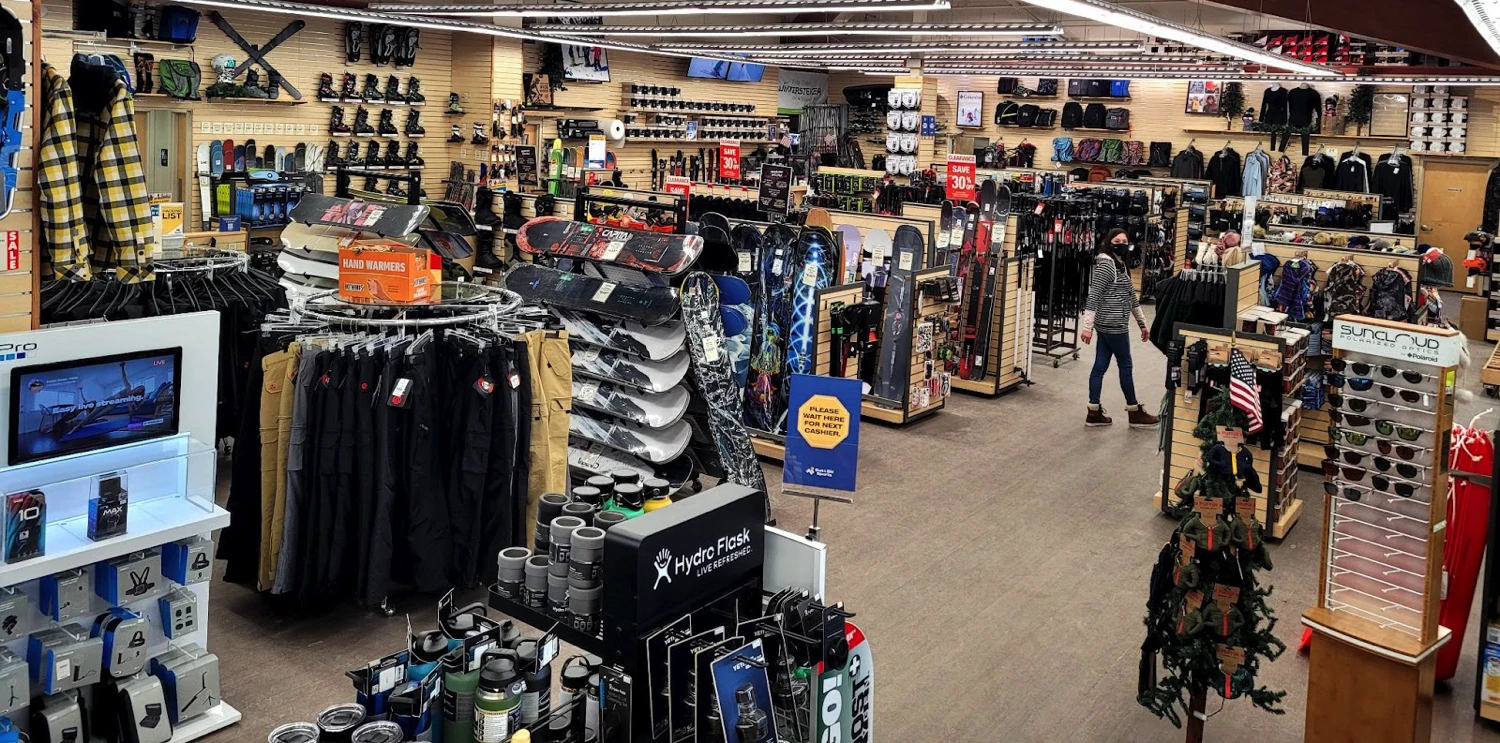 Snowboard shop service at Sun & Ski Sports.