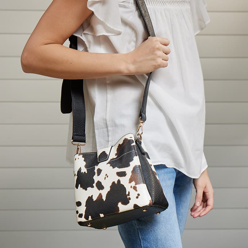 Cow Print Crossbody Bag with Black Accents Cracker Barrel
