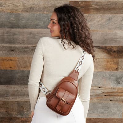 Brown Sling Backpack with Embroidered Strap