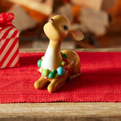 Sitting Reindeer with Wreath