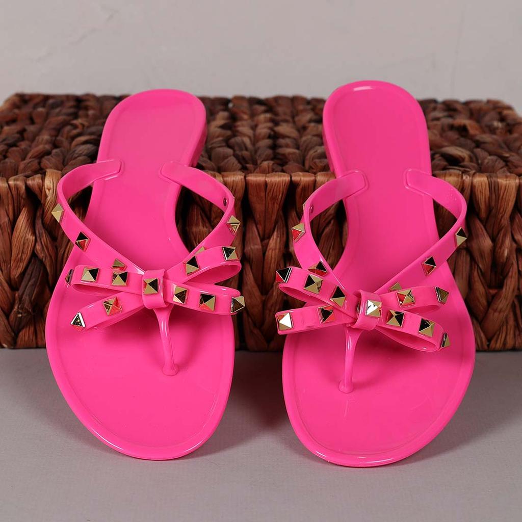 Neon pink best sale jelly sandals