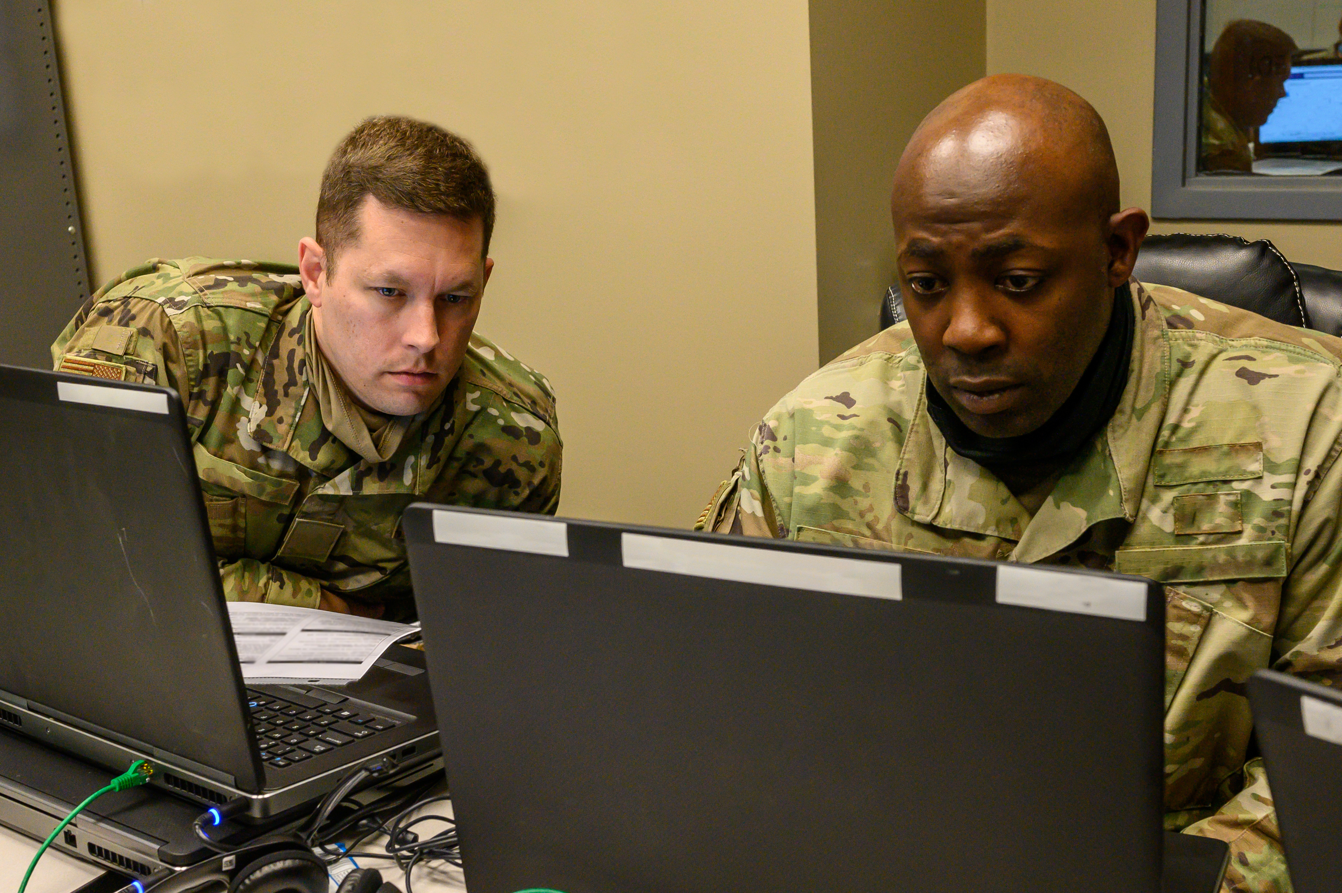 A man watching Courseware videos in laptop