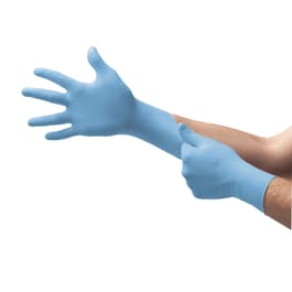 Light blue nitrile exam gloves on hands