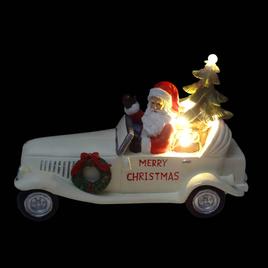 Alpine LED Santa in Vintage White Car Statue