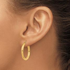 Gold Classics™ 10kt. Polished 23mm Tube Hoop Earrings