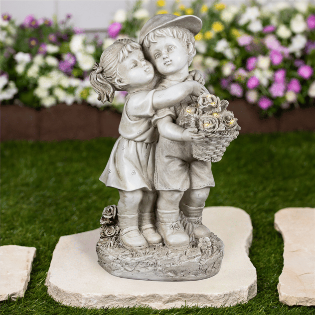 Northlight Solar Hugging Girl and Boy Outdoor Garden Statue